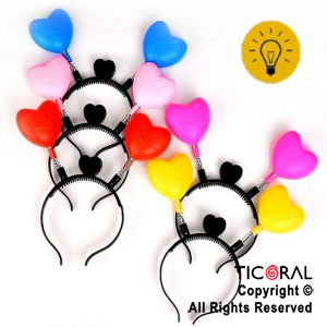 VINCHA CORAZON LUMINOSA CON RESORTE COLORES SURTIDOS X 1