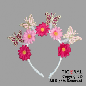 VINCHA FLORES MARGARITAS Y MARIPOSAS ROSA Y FUCSIA x 1